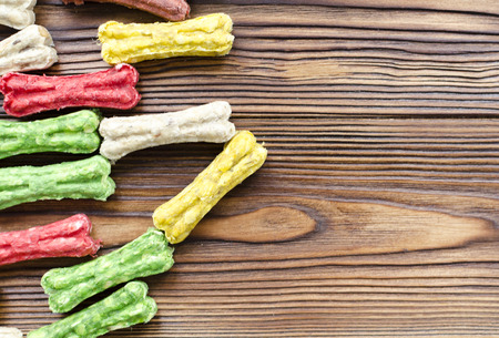 multicolored chewing bones with rice. dog food.の写真素材