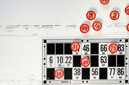 play bingo on vintage white wooden tableの写真素材