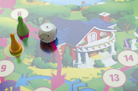table game for children: chips, dice and play boardの写真素材