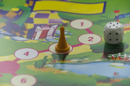 table game for children: chips, dice and play boardの写真素材