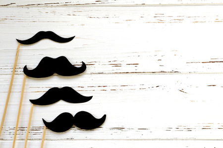 photo props - black paper mustache on white vintage  backgroundの写真素材