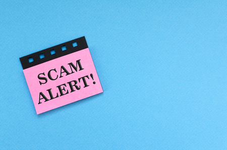 scam alert on stickerの写真素材