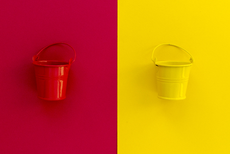 empty toy bucket on paper backgroundの写真素材