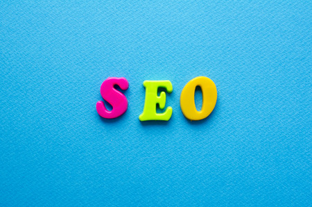 seo on blue backgroungの写真素材