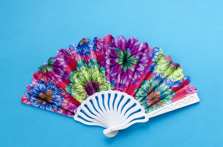 colored fan on paper backgroundの写真素材