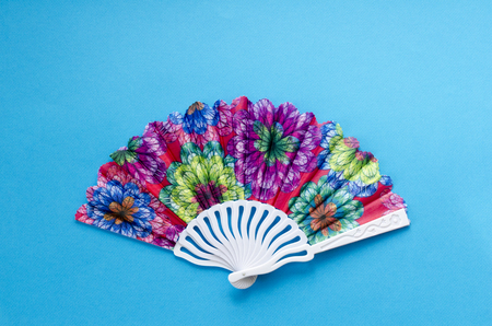 colored fan on paper backgroundの写真素材