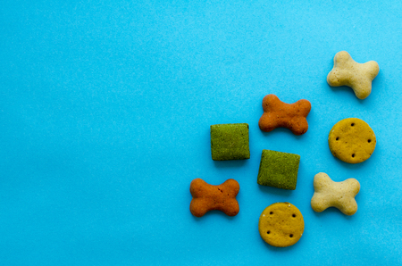 biscuits for dogs on blue paper backgroundの写真素材