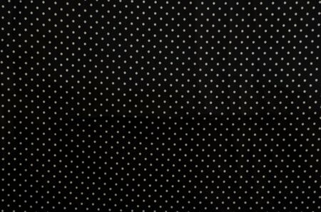 fabric texture: white spots on black backgroundの写真素材