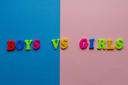 words from colored plastic words on paper backgroundの写真素材