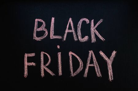 chalk drawn words black friday on blackboardの写真素材
