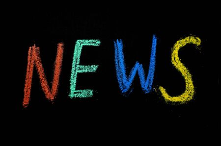 colored word "news"drawn on blackboardの写真素材