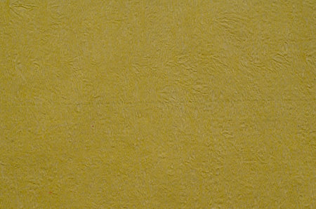 mustard  crepe paper background texturedの写真素材