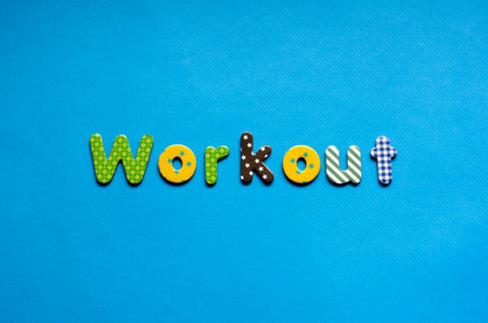 word workout on blue paper backgroundの写真素材