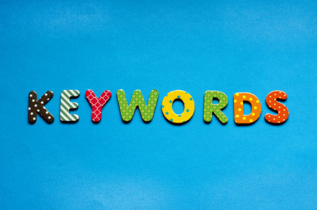 word keywords on blue paper backgroundの写真素材