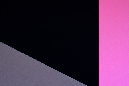 Colored geometric grey, black, pink paper texture backgroundの写真素材