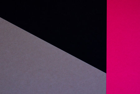 Colored geometric grey, black, pink paper texture backgroundの写真素材