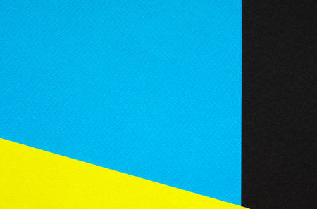 Blue and yellow paper background. Copy space for text or design.の写真素材