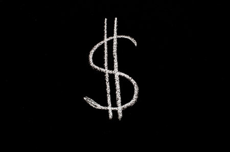 dollar symbol drawn on blackboardの写真素材