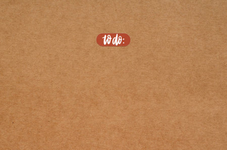 to do list on brown craft paper backgroundの写真素材
