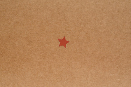 star on brown craft paper backgroundの写真素材