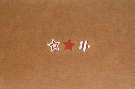 three stars on brown craft paper backgroundの写真素材
