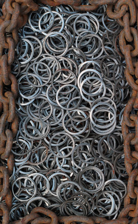 Metal rings and rusty chain. Background image