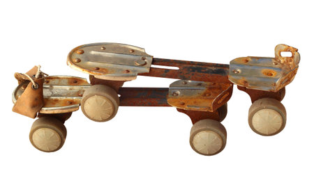Old rusty roller skates, isolated on white background