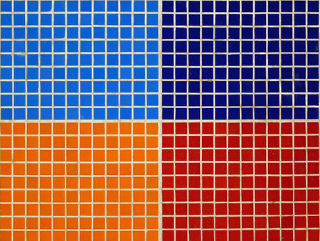 Colorful square ceramic tiles in swimming pool