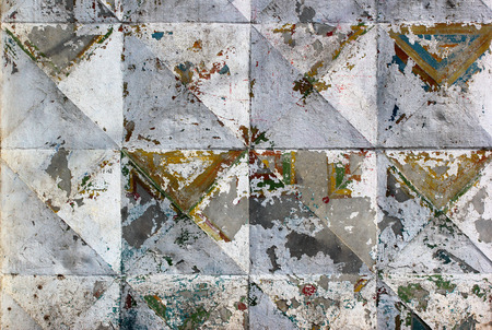 Abstract weathered texture stained old flaking stucco and paint light gray concrete wall background, grungy blocks of stonework technology architecture wallpaperの写真素材