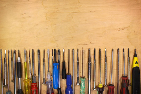 Many various old fashioned screwdrivers