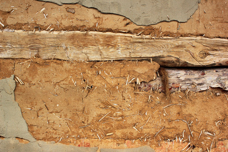 Old wooden and earthen wallの写真素材