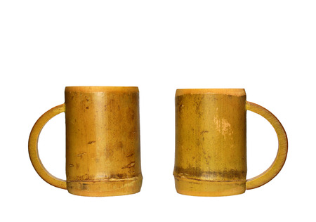 Two bamboo cups isolated on white backgroundの写真素材
