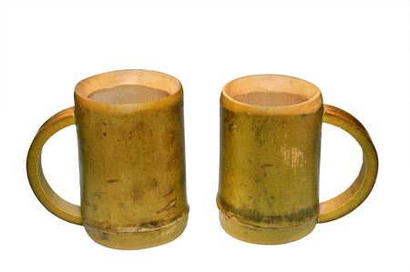 Two bamboo cups isolated on white backgroundの写真素材