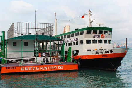 HONG KONG, MARCH 21, 2012: Passenger ferry at Wan Chai Terminal. Ferries connect the Hong Kong Island with Kowloon and Tsim Sha Tsui across Victoria Harbour.のeditorial素材