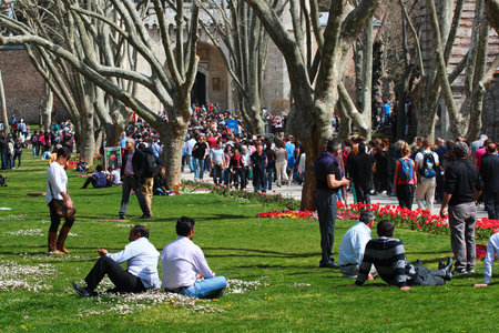 ISTANBUL, TURKEY - APRIL 8, 2012: People relaxing and enjoying warm spring weather in Gulhane park, the oldest public park in Istanbul.のeditorial素材