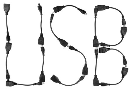 Word USB made of OTG cables and connectors, isolated on white