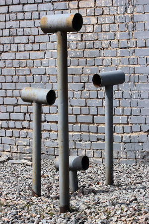 Metal chimneys and ventilation pipes with wind deflectorsの写真素材