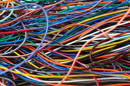 Colorful mess of cables wires and connectors