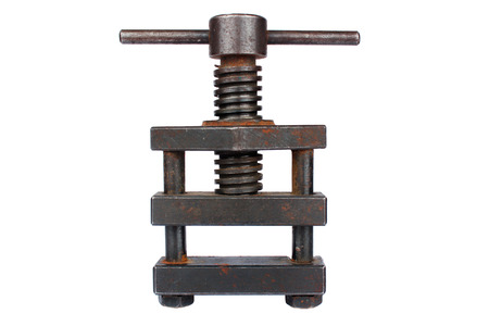 Old metal screw press isolated on white backgroundの写真素材