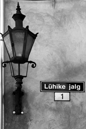 TALLINN, ESTONIA - JULY 9, 2017: Street nameplate at Luhike jalg, or Short Leg street in the Old Town of Tallinn,  and popular tourist destination.のeditorial素材