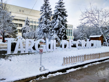 Chisinau, Moldova - December 18, 2017: Plastic words Christmas Fair in Romanian as decoration of a street Christmas fair, organized in public park in central part of the city.のeditorial素材