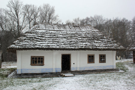 Chernivtsi, Ukraine - December 20, 2017: Regional open-air museum of folk architecture. Exhibition consists of the two architectural and ethnographic areas of Hotynschyna and West Dniester.のeditorial素材