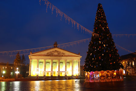 Ternopil, Ukraine - December 15, 2011: Building of Academic Drama Theatre of Taras Shevchenko and Christmas tree on Theater Square at night.のeditorial素材