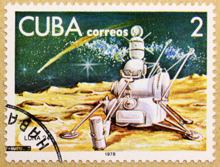 KHARKIV, UKRAINE - MARCH 5, 2018: Post stamp of Cuba, dedicated to Moon exploration and artificial satellites.のeditorial素材