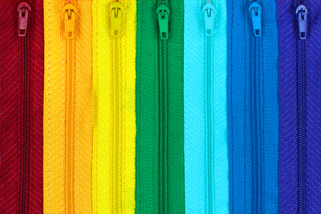 Rainbow colored zippersの写真素材