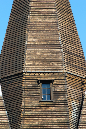 Weathered wooden planks on tower of old church in Voss, Hordaland county, Norwayの写真素材