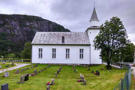 Lunde, Norway - June 11, 2018: Lunde Church, a parish church in Sirdal municipality in Vest-Agder county, Norway. It is located in the village of Lunde and was built in 1873.のeditorial素材