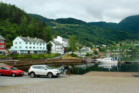 Ulvik, Norway - June 24, 2018: View of Ulvik village in Hordaland county, the popular resort at the end of Ulvikafjord, with coastal promenades and beautiful rural landscapes.のeditorial素材