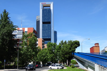 Madrid, Spain - May 20, 2017: Four modern skyscrapers in the Cuatro Torres Business Area. Crystal, Space, Pwc and CEPSA Towers are the tallest buldings in the country.のeditorial素材