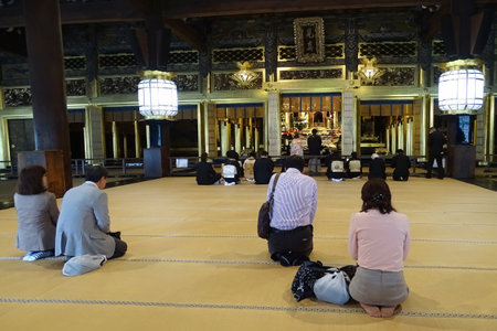 Kyoto, Japan - October 7, 2017: People pray in the Nishi Hongan-ji temple, a UNESCO World Heritage Site.のeditorial素材